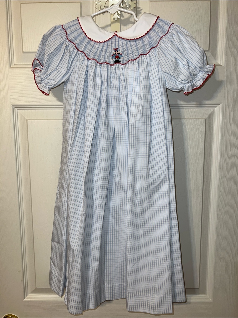 Blue Check Girls' Smocked Soldier with Red Trim Dress.